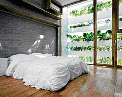 WORKS AT MANY LEVELS The Stacking Green House, a four-level tube house designed by the Vietnamese architect. (Oki Hiroyuku via NYT)