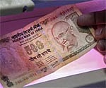 Rupee advances by 33 paise against dollar