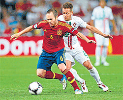 THE ILLUSIONIST: Andres Iniesta (No 6) goes about his business in a quiet but  effective way. AFP