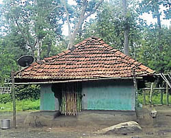 The country tiled house of Rajesh at Balle in HD Kote taluk fitted with dish antenna. dh photo