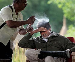 Megastar Amitabh Bachchan, brand ambassador of Save Our Tigers, gets ready for a shot during a Fund Raising event of NDTV at Ranthambore, Rajasthan on Sunday. PTI