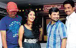 Best wishes: Shubha Punja celebrates her birthday with the cast of Production No. 1.