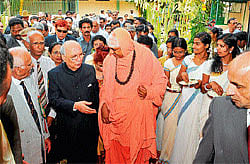 Education: Governor H R Bhardwaj at the release function of subject encyclopaedia at KSOU, Mysore, on Tuesday. Registrar B S Vishwanath, Dr C N Manjunath, KSOU VC K S Rangappa and Prafullata Bhardwaj are seen. (Left) President of MES R Vasudeva Murthy, secretary P R Naga Srinivas, seer Sri Shivarathri Deshikendra Swamiji of Suttur mutt and H R Bhardwaj arrive for Platinum Jubilee celebration of Mahajana Education Society. (Below) Students at the inauguration of new block of Sreekantha Womens PU College. DH Photos