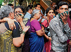 inconsolable: Relatives and neighbours mourn at the slain couples residence at JP Nagar on Friday. dh photo