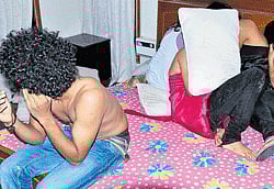 A male victim stripped and the group huddled together and forced to pose for TV camera crew summoned by the Vedike. DH photo