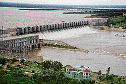 aftermath: Water is released from all the 26 crest gates of the Almatti reservoir on Saturday.