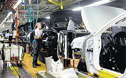 REPLICATING&#8200;A&#8200;SUCCESSFUL MODEL: Workers assemble Nissan cars on the production line at the Nissan manufacturing plant in Smyrna, Tennessee. NYT