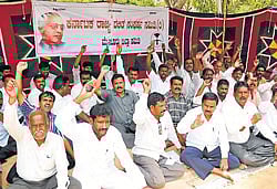 protests galore: (Left) Activists under the banner of Karnataka Rajya Dalita Sangharsha Samithi stage a protest against social discrimination of Dalits near the office of deputy commissioner in Mysore on Tuesday.