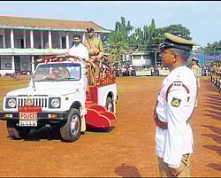 Celebrating 65 years of freedom: District-in-Charge Minister C T Ravi receives guard of honour by the platoons on the occasion of the 66th Independence Day celebration at Nehru Maidan in Mangalore on Wednesday.