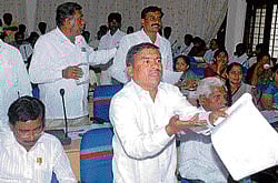 heres the proof: Chikkaballapur Zilla Panchayat members Raghavendra Hanuman, Shrirama Reddy, P N Munegowda and K M Sathish speak at the progress review meeting on Thursday. dh photo