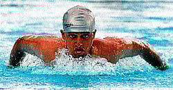 M K Muttanna of Mahajanas College bagged six gold medals at inter-collegiate championship at the University Swimming Pool in Mysore on Thursday. DH Photo by Prashanth H G