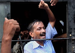 Social activist Arvind Kejriwal after being detained by the Delhi police near PM residence, during a protest on coal block allocation issue in New Delhi on Sunday. PTI Photo