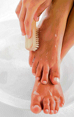 CLEAN & CLEAR Use a pumice stone on the heels and side of the soles to remove dead skin.