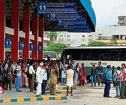 the new and old: Rural buses too are operated from new bus stand, causing confusion among passengers. Boulders placed at the entrance of the old bus stand to prevent buses from entering the premises. DH Photos