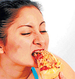 gorging on People prefer junk food while eating out.