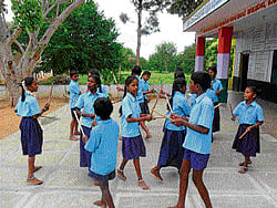 Great time: Students of the Government Higher Primary School, Kallikuppa in Kolar Gold Fields. dh photo