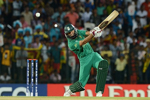 South African cricketer Hashim Amla plays a shot during the ICC Twenty20 Cricket World Cup match between South Africa and Sri Lanka at The Mahinda Rajapaksa International Cricket Stadium in Hambantota on September 22, 2012. AFP PHOTO / Ishara S.KODIKARA