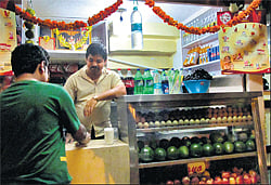 confident Small shop owners feel that FDI in retail will not affect their business.