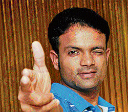 lights, camera, action: Olympic medallists Vijay Kumar and Gagan Narang pose on Tuesday. DH PHOTOs