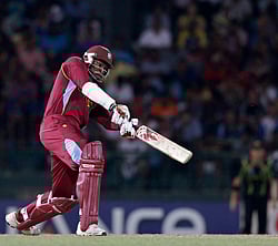 West Indies Chris Gayle plays a shot during their Twenty20 World Cup semi-final cricket match against Australia in Colombo October 5, 2012. REUTERS/Dinuka Liyanawatte