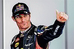 leading the charge: Mark&#8200;Webber gestures after capturing pole position in the Korean GP on Saturday. AFP