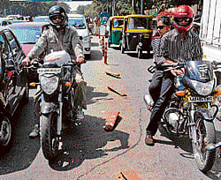 physical evidence: A majority of plastic tubular cones installed on MG&#8200;Road in June have now been knocked down by motorists. DH Photo