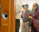 file photo shows a bullet hole on a door frame inside a gurdwara in Oak Creek, Wisconsin. AP