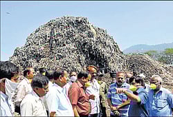 Its stinking: Minister S A Ramdas makes a point to MCC commissioner M R Ravi during his inspection at waste treatment plant in Mysore on Tuesday. DH Photo