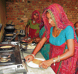 HAPPILY EMPLOYED Santara Devi and members of the Sanjha Gas group of Jogia ka Bas village. Picture courtesy WFS.