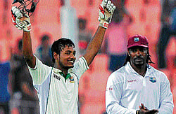 dream start: Bangladeshs Abul Hasan exults after becoming only the second No 10  batsman in cricket history to score a century on debut. AFP