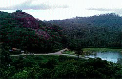 The landscape in and around Moribetta; an old Shaiva temple and a porthole. (Photos by Mookonda Kushalappa