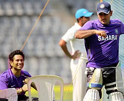 Mumbai : Skipper MS Dhoni and Sachin Tendulkar during a practice session at Wankhade Stadium in Mumbai on Thursday. PTI Photo by Mitesh Bhuvad