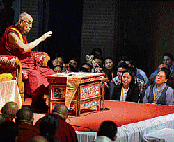 words of peace: The Tibetan spiritual leader, the Dalai Lama, addresses an audience of Tibetans at a meeting organised by the Central Tibetan Administration (South Zone) in Bangalore on Tuesday. dh photo