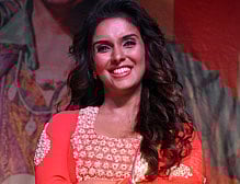 Actress Asin Thottumkal poses during a promotional event for the forthcoming Hindi film Khiladi 786 directed by Ashish R Mohan in Mumbai late November 27, 2012. AFP PHOTO/STR