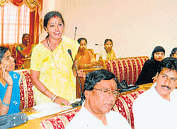 WOMEN IN POWER : Prabha T S (in yellow) participating in a council meeting.  Pic COURTESY WFS.