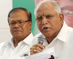 B.J. Puttaswamy with B.S. Yeddyurappa. File Photo