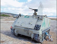 An illustration shows a soldier (circled in red) wearing camouflage uniform over a tank who is rendered almost invisible. IMAGE FOR REPERSENTATION ONLY