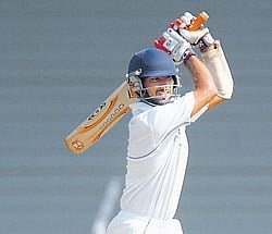 Cheteshwar Pujara dashed Karnatakas hopes with a brilliant 261 not out. File photo