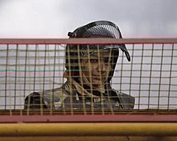 A policewoman stands guard at a barricade to stop protesters, near India Gate in New Delhi. Reuters photo