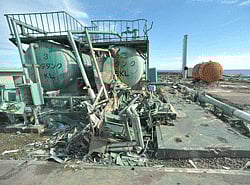 Crushed piping is observed from inside a bus at the crippled Fukushima Dai-ichi nuclear power station in Okuma, Fukushima Prefecture, Japan, Saturday, Nov. 12, 2011. Media allowed into Japan's tsunami-damaged nuclear power plant for the first time Saturday saw a striking scene of devastation: twisted and overturned trucks, crumbling reactor buildings and piles of rubble virtually untouched since the wave struck more than eight months ago. AP file Photo