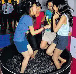 EXCITED: Visitors enjoying grape stomping.