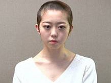 Japan pop idol shaves head after sex scandal