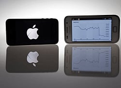 An Apple IPhone 4s and Samsung Galaxy S are seen in this illustration photo in Berlin in this August 27, 2012 file photo.