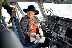An amused Nancy Powell, US Ambassador to India, sits in the cockpit of Boeing C-17.
