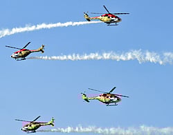 Sarang team performs during the last day of Aero India 2013 at Yelahanka Air Base in Bangalore on Sunday. DH Photo