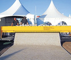 Now, machine that rolls out a carpet of bricks