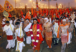 :Allahabad: Swami Nithyananda at the bank of the 'Sangam' to take a holy dip on the occassion of 'Mauni Amavasya,' considered most auspicious day during the Maha Kumbh Mela in Allahabad on Sunday. PTI Photo