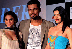 ndian Bollywood personalities (L-R) Aditi Rao Hydari, Randeep Hooda, and Sara Loren pose during an event for the Hindi film 'Murder 3' in Mumbai . AFP