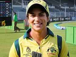 Australian player Lisa Sthalekar poses with Player of the Match trophy after the Women's World Cup match against England at the Brabourne Stadium in Mumbai on Friday. PTI Photo