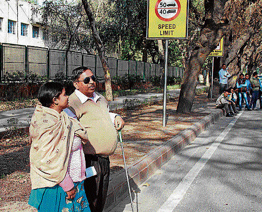 After the first  beep, cross safely